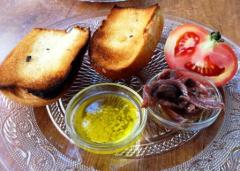 Toast, olive oil and anchovies